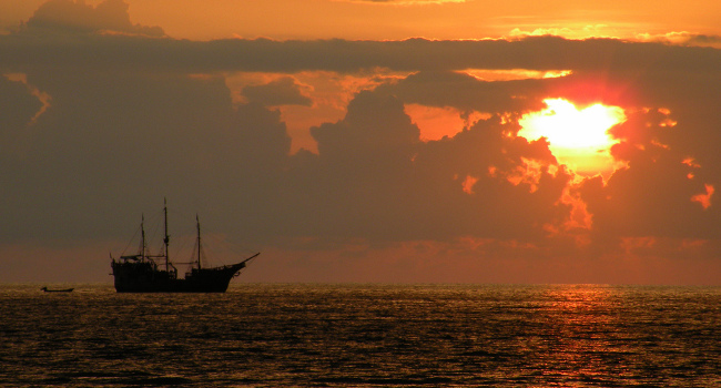 Pirate Ship and the Setting Sun, August 2009 by Paul Hamilton