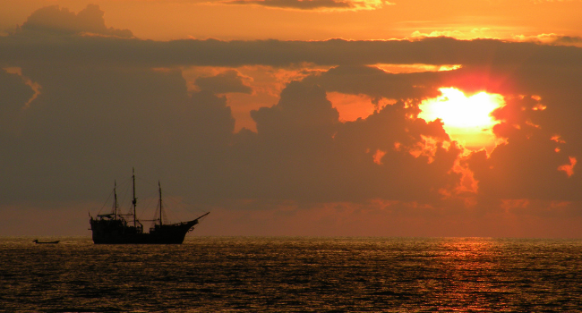 Pirate Ship and the Setting Sun, August 2009 by Paul Hamilton
